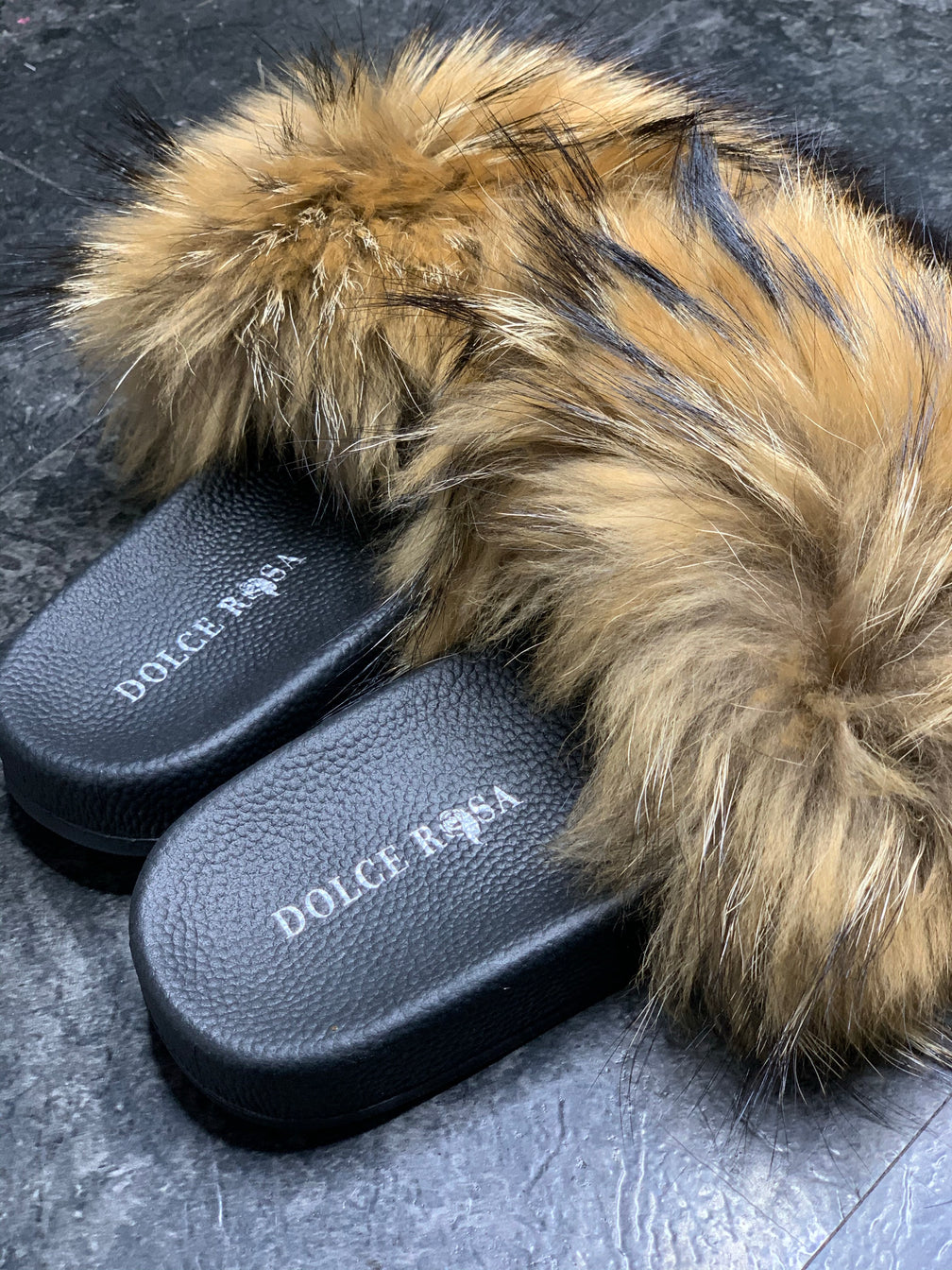 Racoon fur slides extra fluffy